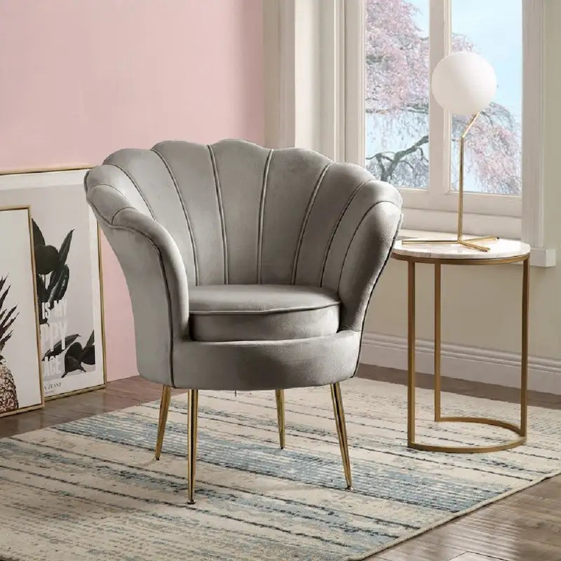 Fauteuil crapaud en velours avec dossier festonné et pieds en métal